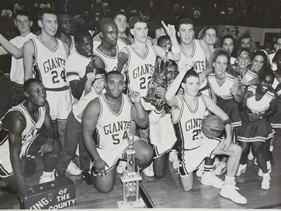 Black and white image of basketball players