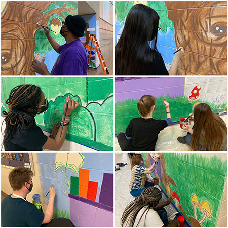 Students painting colorful murals at BDNGC